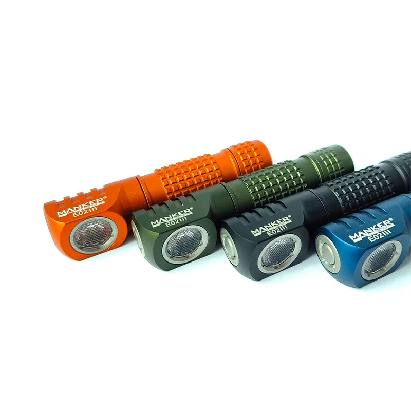 Four Manker flashlights in orange, green, black, and blue on a white background