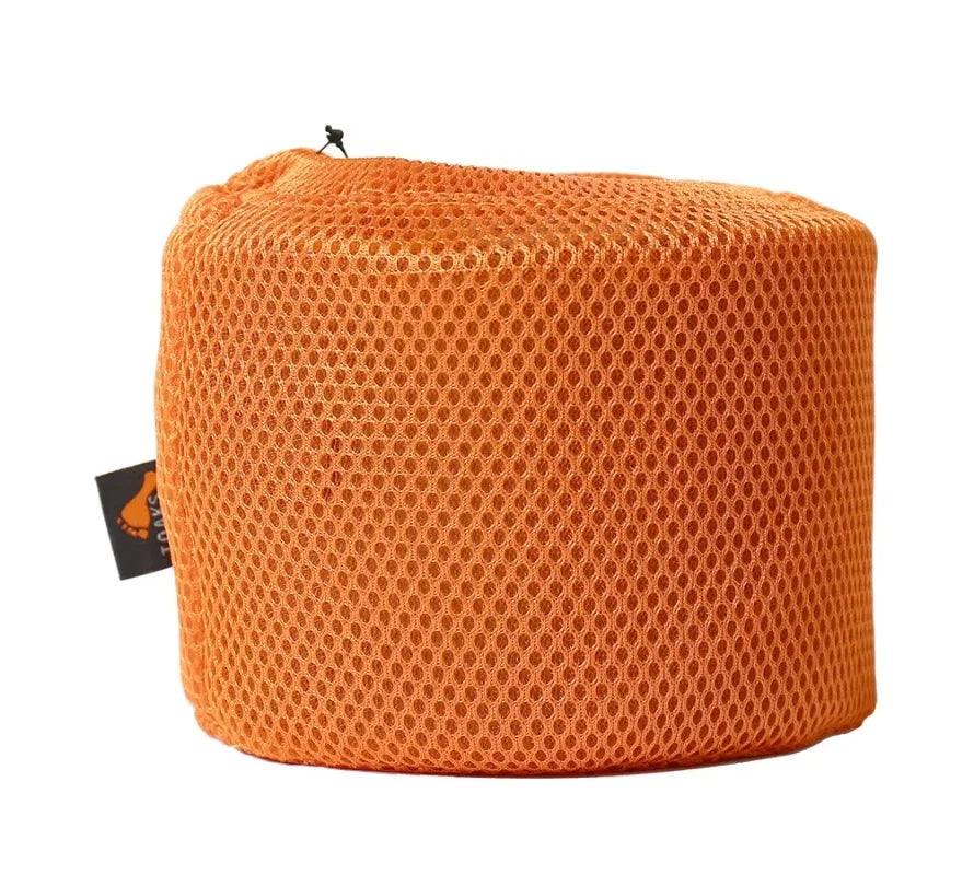 Orange mesh bag with a brand tag on a white background