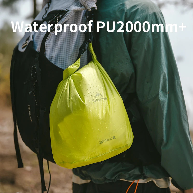 yellow drypack hanging from a backpack