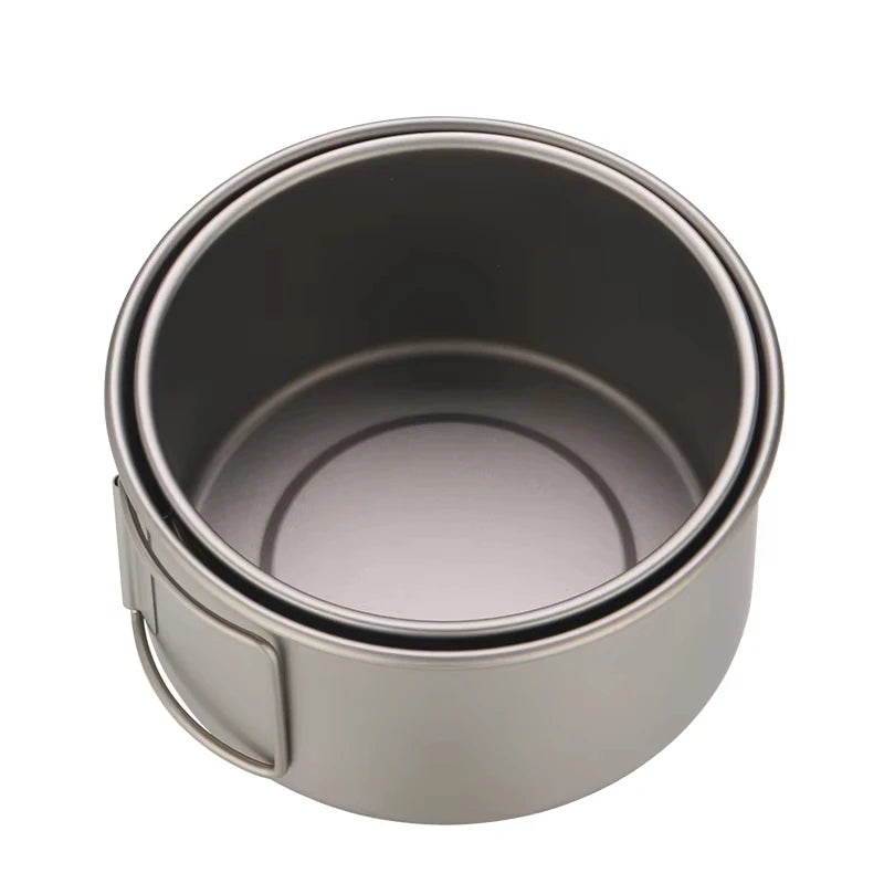 Stackable metal containers on a white background