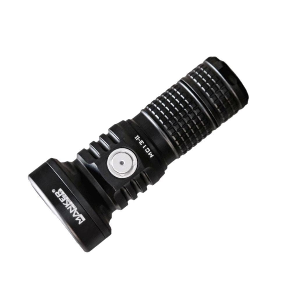 Black flashlight with 'manker' branding on a white background