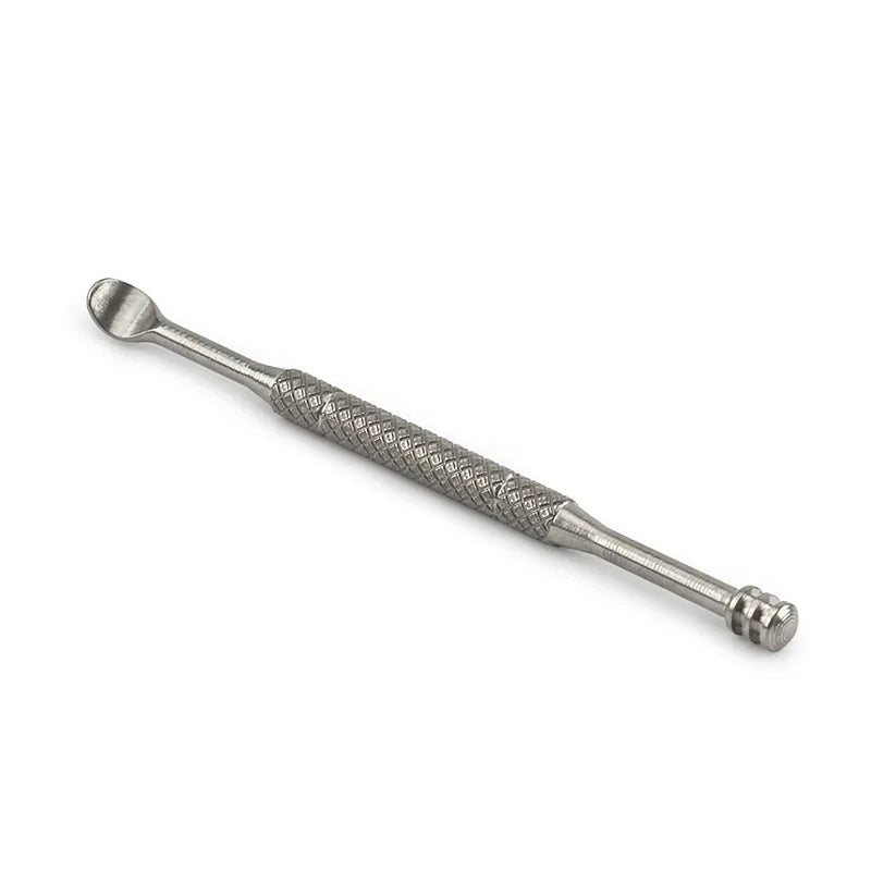 Metal ear spoon on a white background