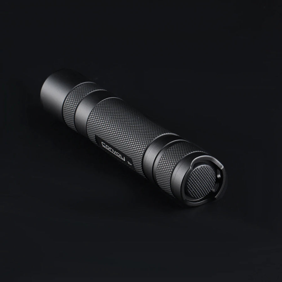 Black flashlight on a black background
