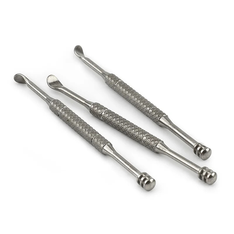Set of 3 metal tools with textured handles on a white background