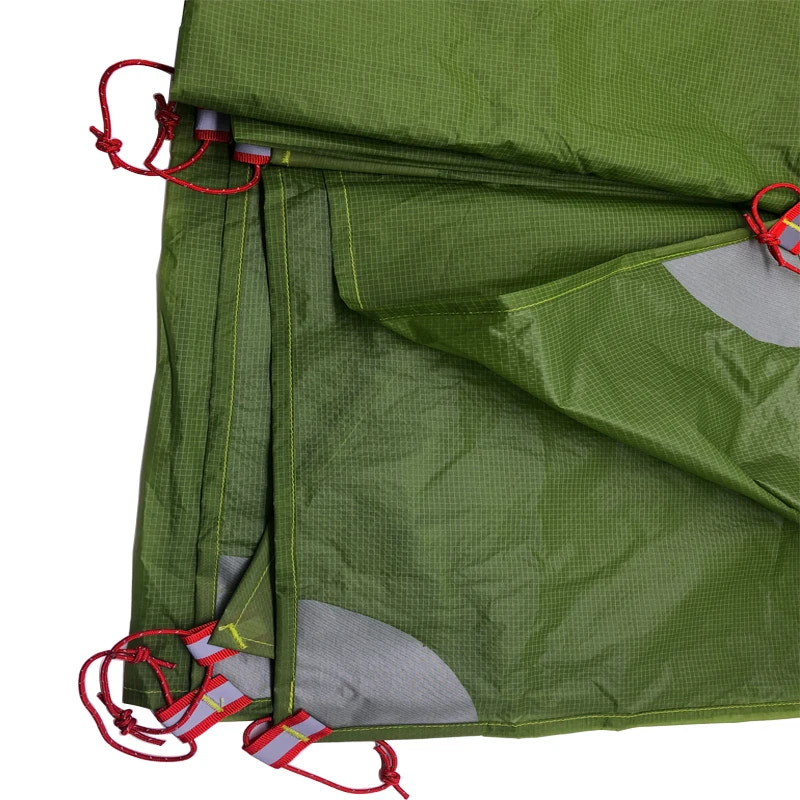 Green fabric with red drawstrings on a white background
