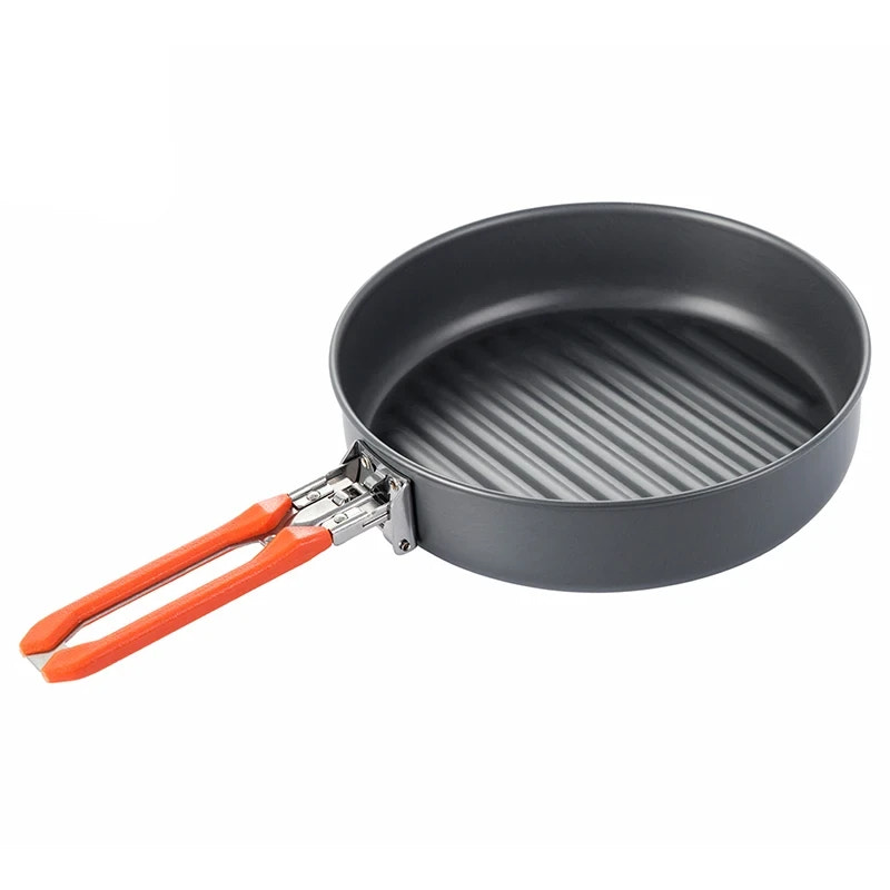 Gray frying pan with orange handles on a white background