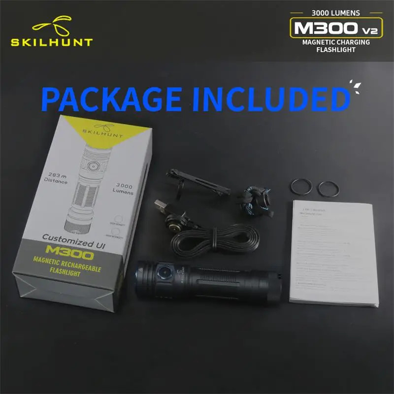 Skilhunt M300 V2 flashlight package with flashlight, box, and accessories on a dark background