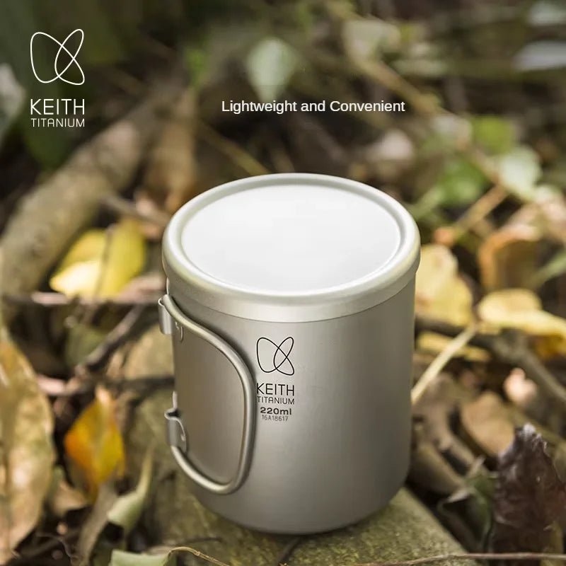 Keith Titanium mug on a natural background with brand logo and product details.