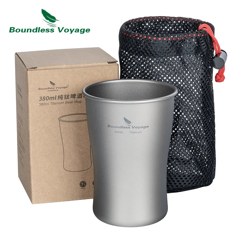 Silver titanium beermug with packaging and carrying pouch on a white background