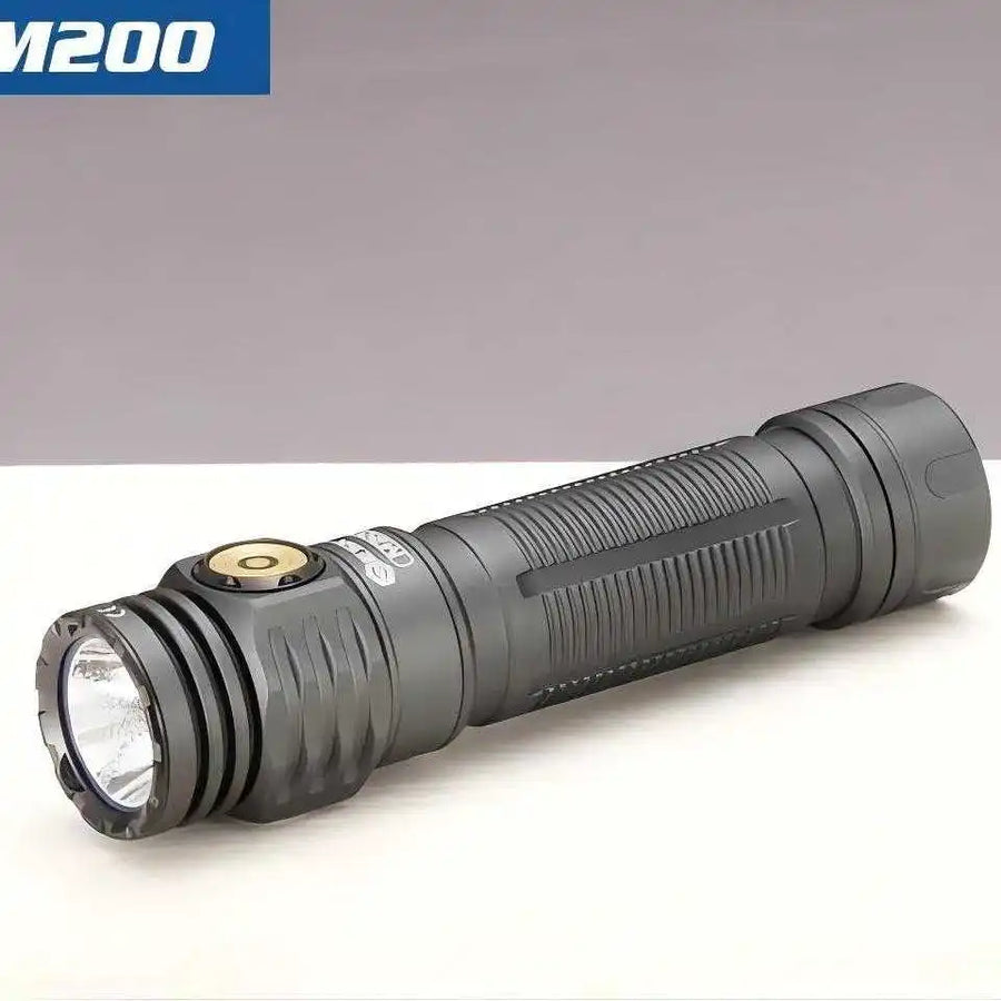 Gray flashlight with visible brand logo on a gray background