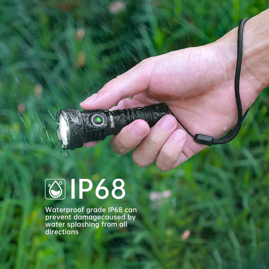 Hand holding a flashlight with IP68 waterproof rating label in a grassy background