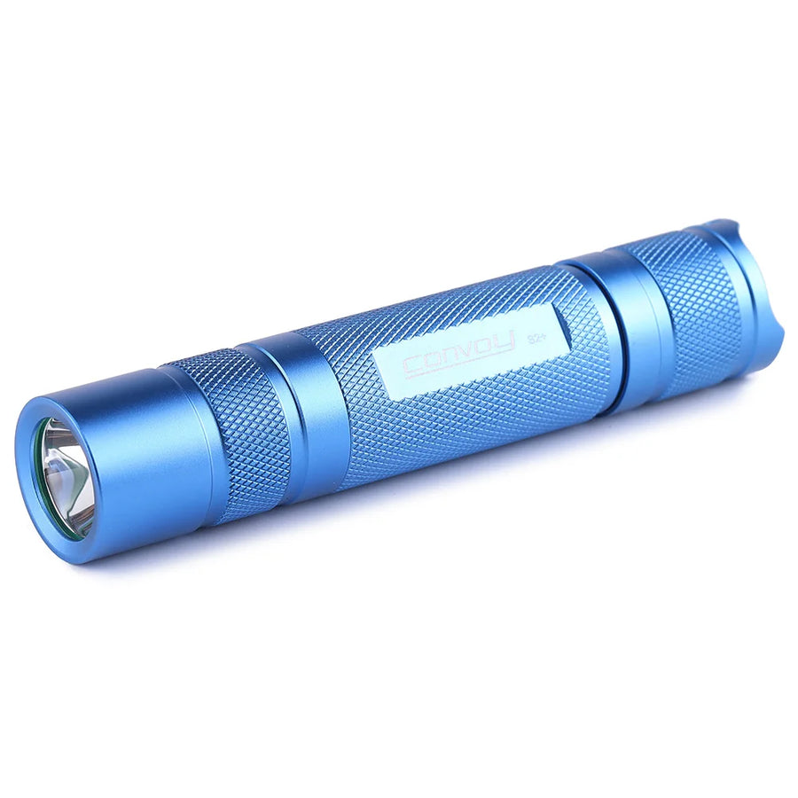Blue flashlight on a white background