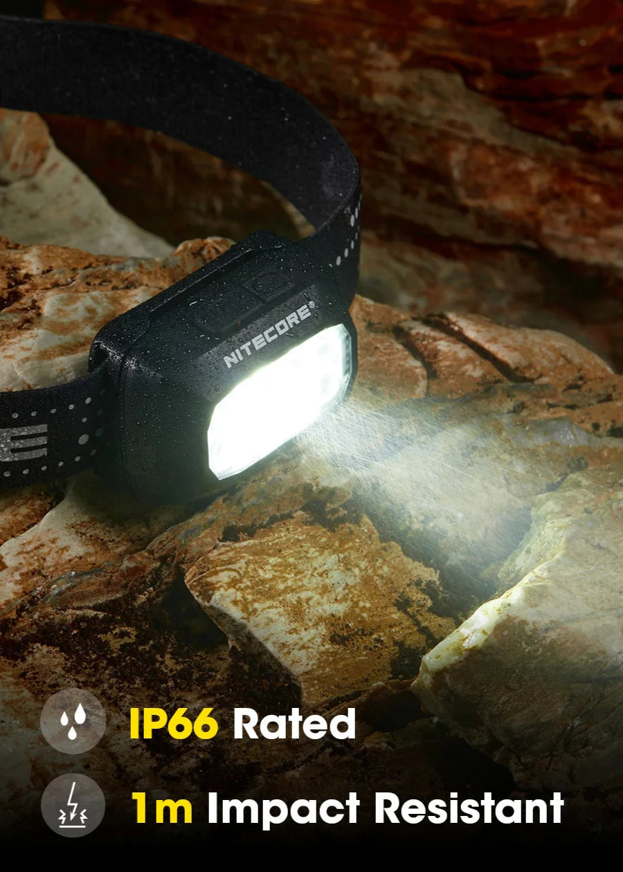 Nitecore headlamp on a rocky surface with IP66 and impact resistant text.