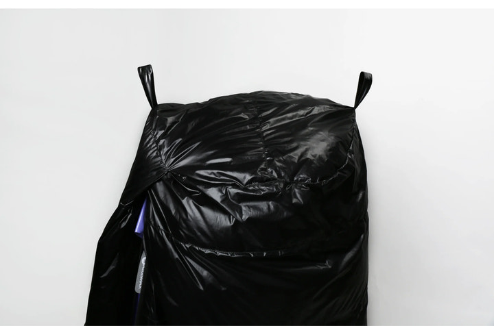 Black sleeping bag on a white background