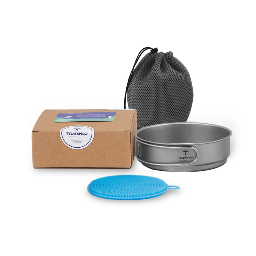 Tomshoo camping cookware set with a frying pan and mesh bag on a white background