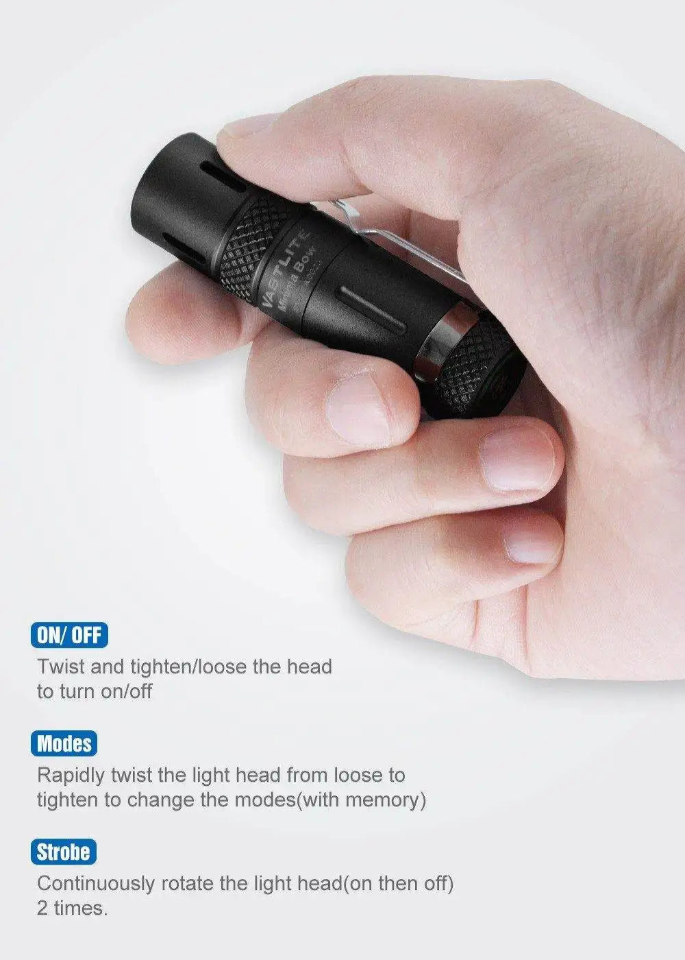 Hand holding a black flashlight with control instructions on a white background