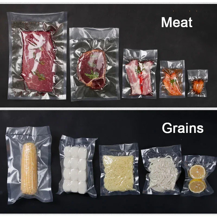 Vacuum-sealed packages of meat and grains on a black background