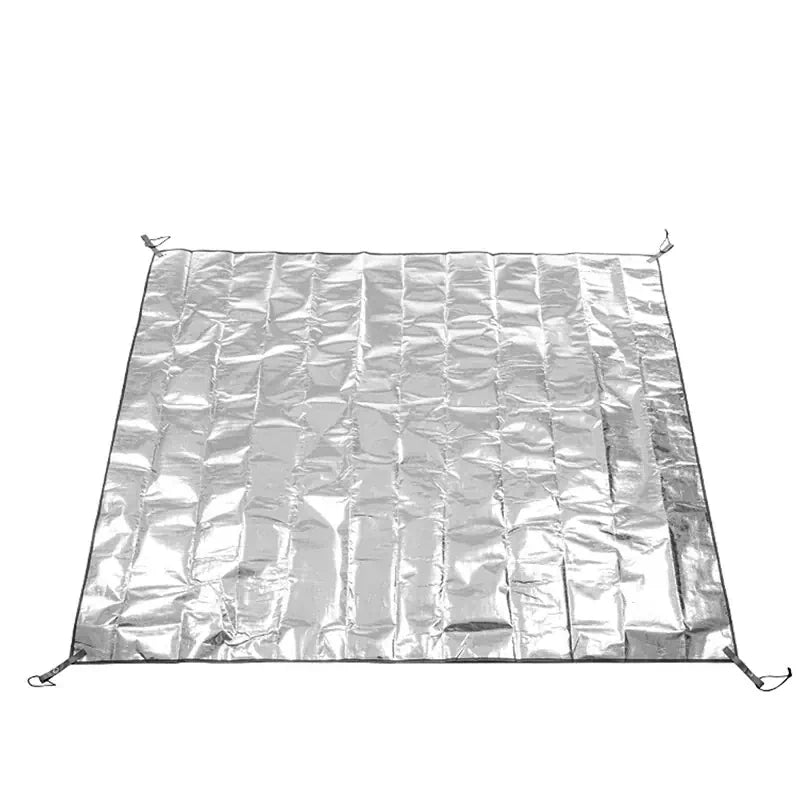 Silver reflective blanket on a white background