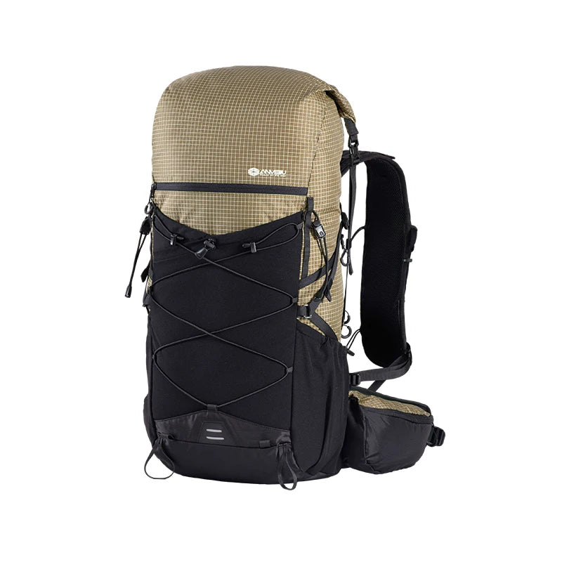 Hiking backpack with beige top section and black sides on a white background