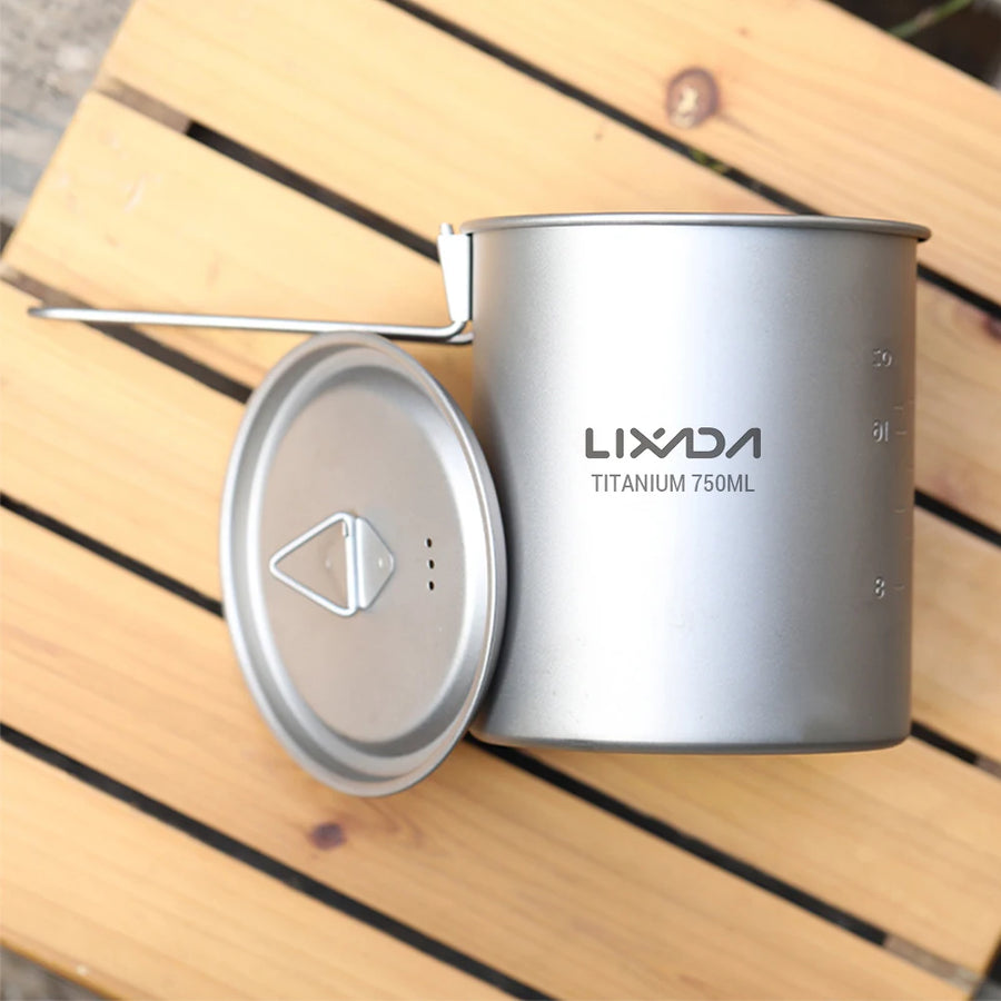 titanium camping pot with lid on a wooden surface, featuring the Lixada brand.