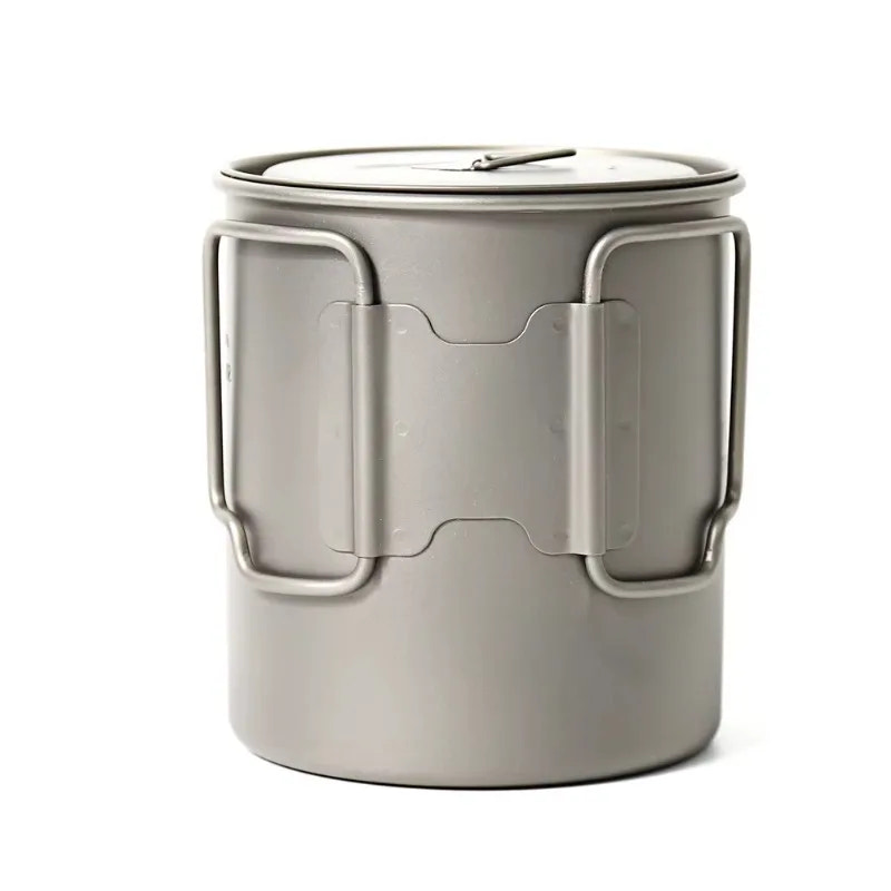 Titanium mug with handle on a white background