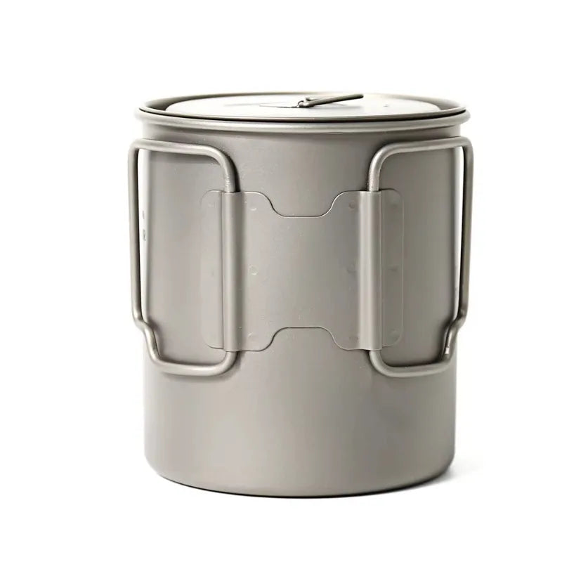 Titanium mug with handle on a white background