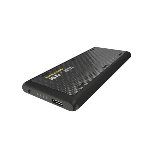 Black power bank with carbon fiber texture on a white background