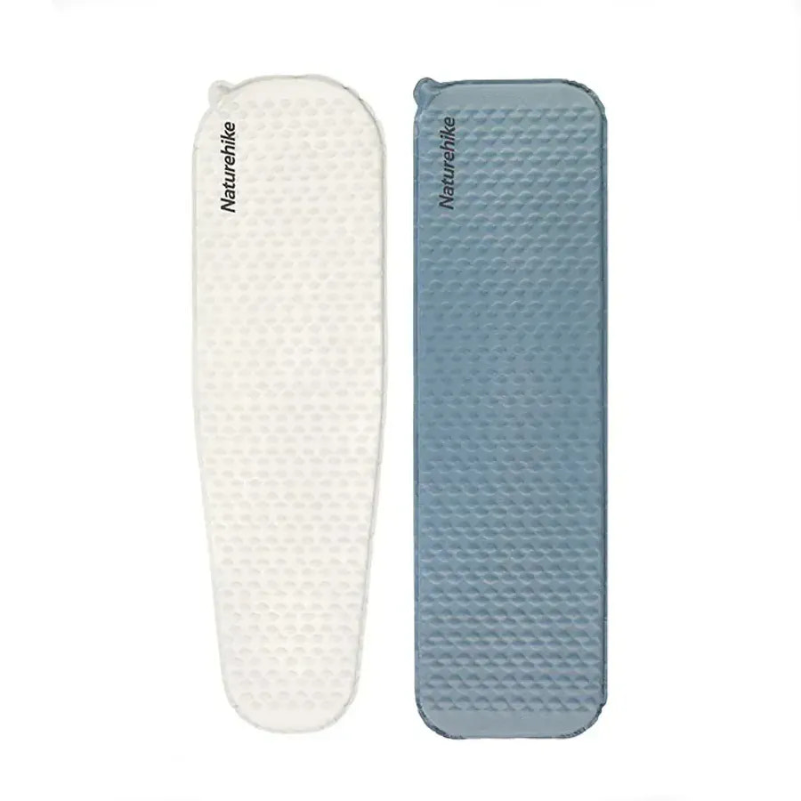 Two inflatable camping mats, one white and one blue, with 'Naturehike' branding on a white background.