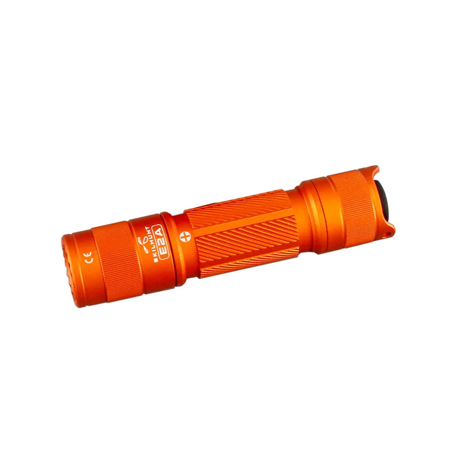 Orange flashlight on a white background