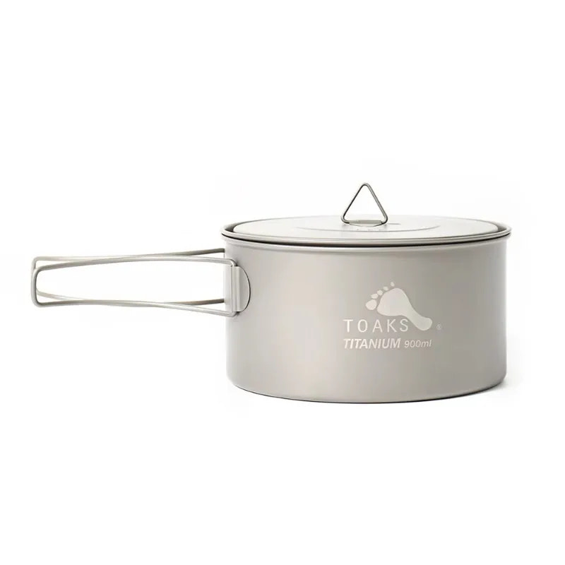 Titanium cook pot with lid on a white background
