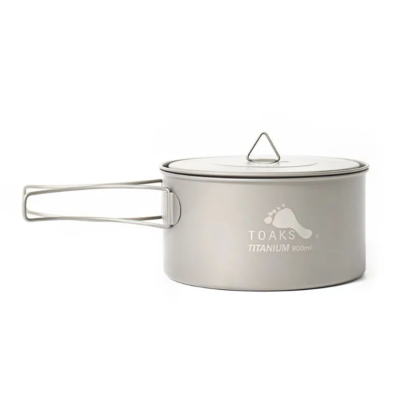 Titanium cook pot with lid on a white background