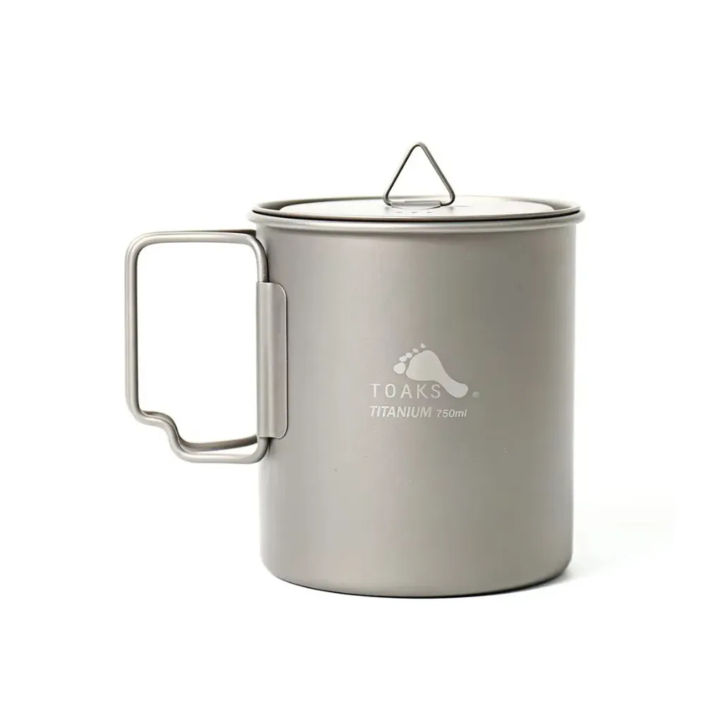 Titanium mug with lid on a white background
