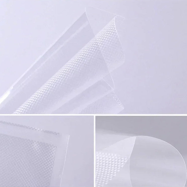 Close-up of a textured white material with a grid pattern on a light gray background.