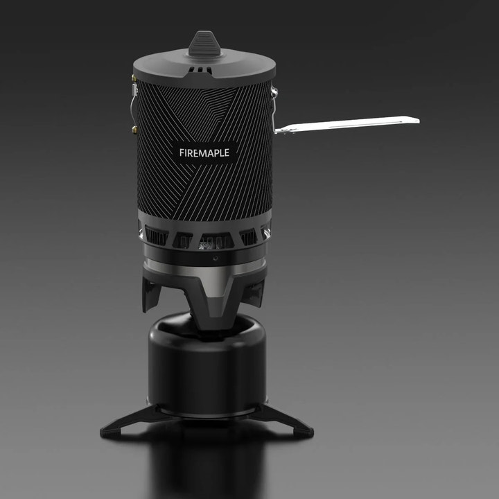 Black portable stove with 'Firemaple' branding on a dark background