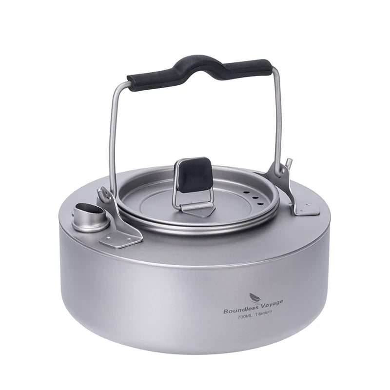 Camping kettle with handle on a white background
