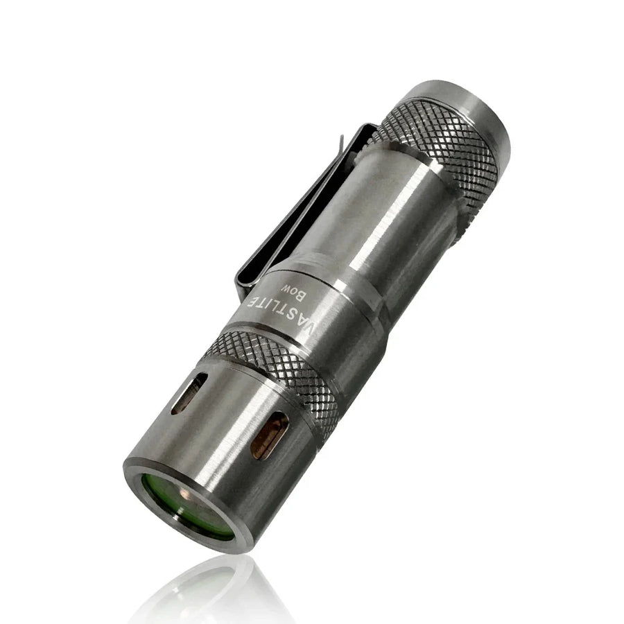 Metallic flashlight on a white background