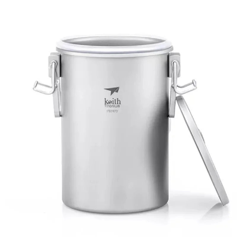 Titanium pot with lid on a white background