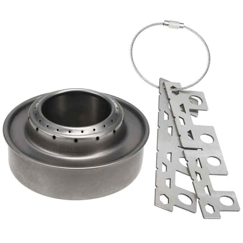 Metal alcohol stove with a keychain on a white background
