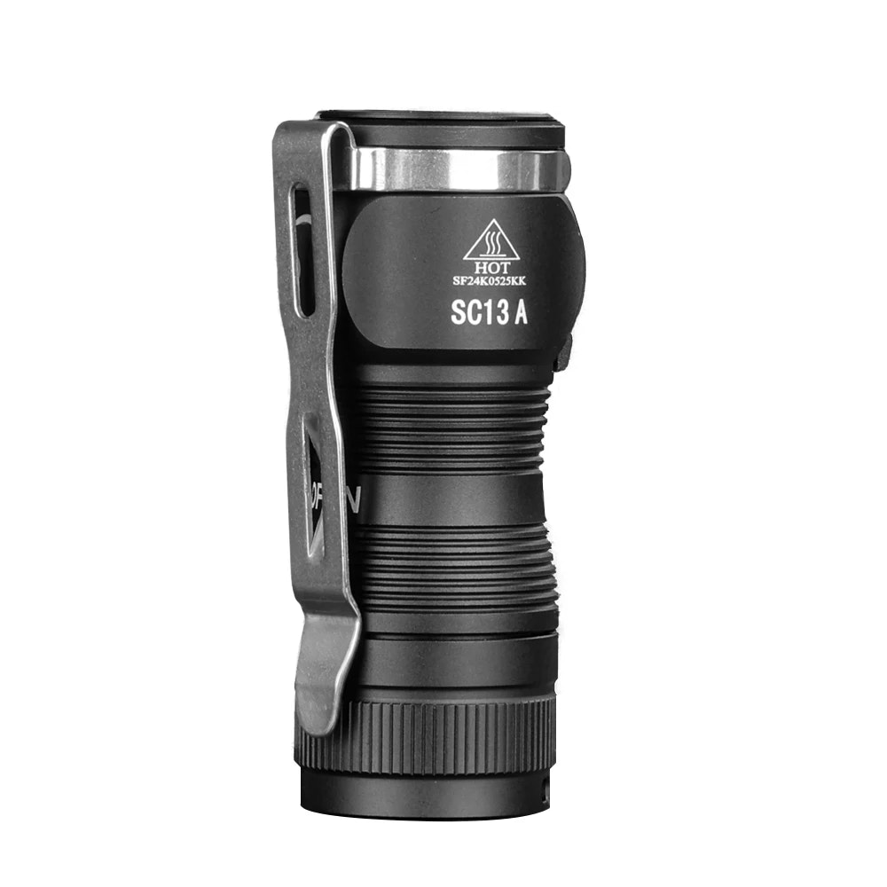 Black flashlight with metallic accents on a white background