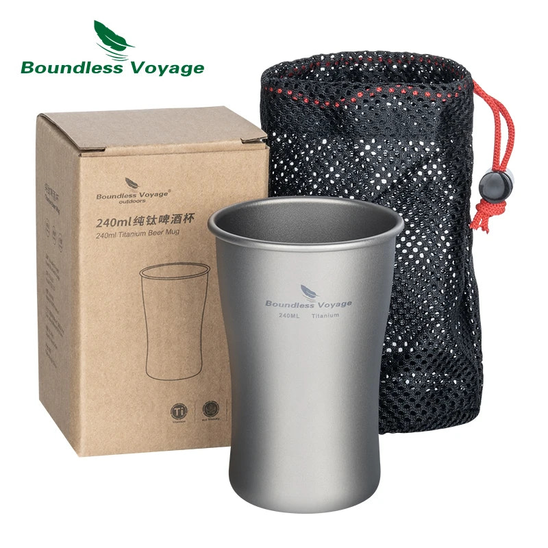 Silver titanium beer mug with packaging, including a cardboard box and black mesh bag, on a white background. Brand 'Boundless Voyage' is visible.