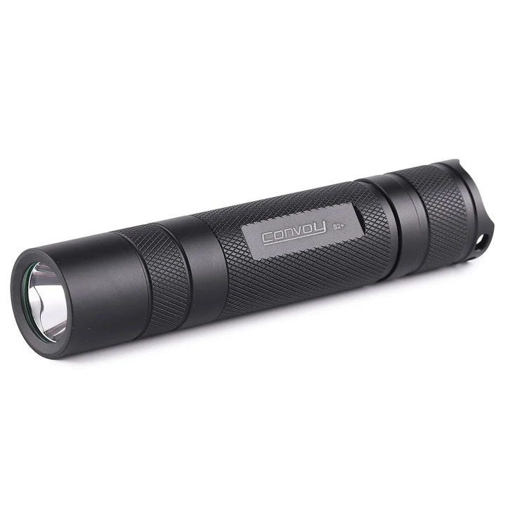 Black flashlight with 'Convoy' branding on a white background