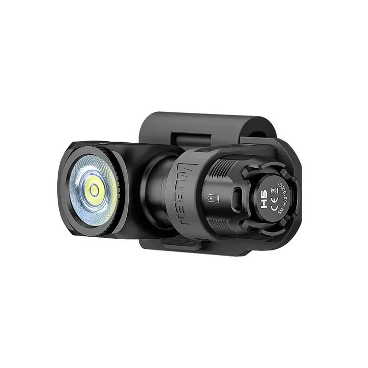 Black tactical light with visible brand logo on a white background