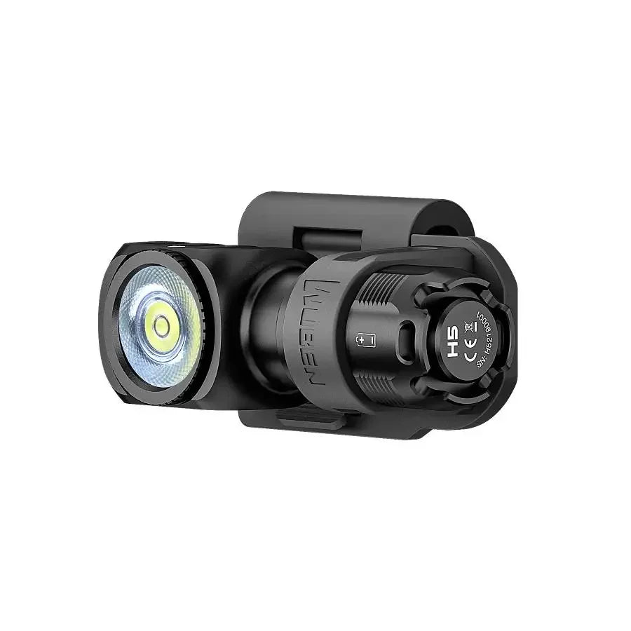 Black tactical light with visible brand logo on a white background