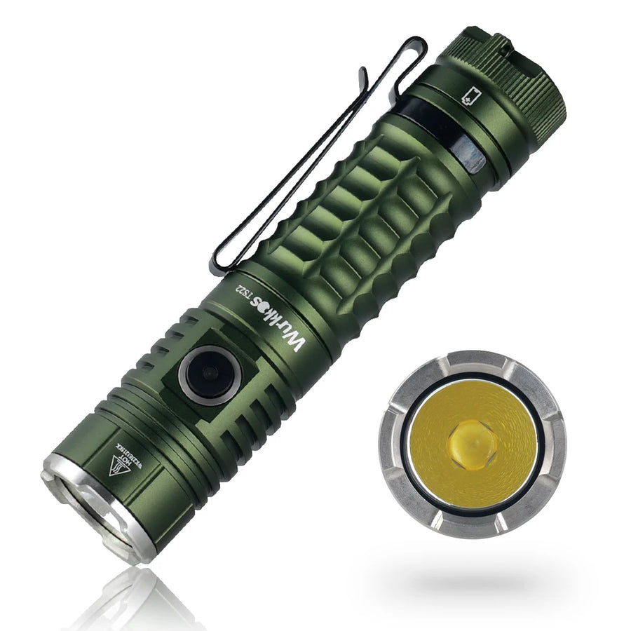 Green flashlight with close-up of lens on a white background