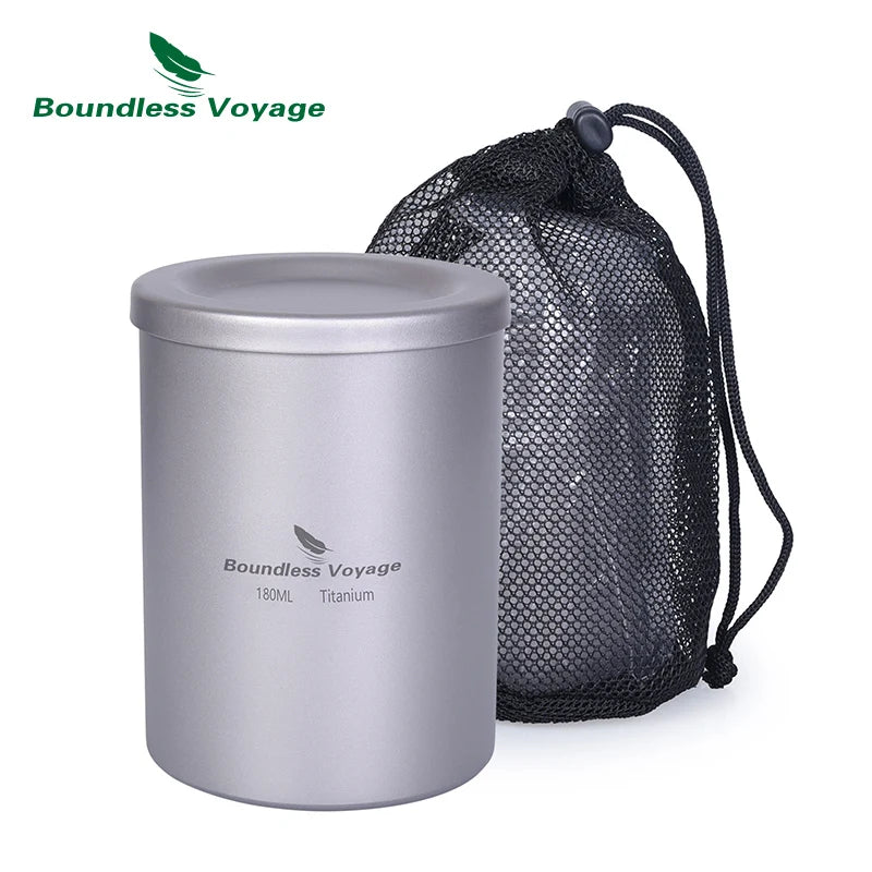 Titanium mug with drawstring bag on a white background, featuring Boundless Voyage branding.