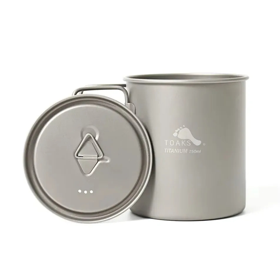 Titanium pot with lid on a white background
