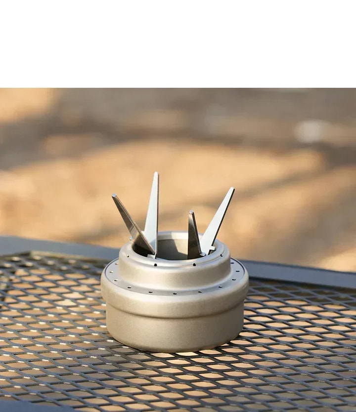 Metallic object with spikes on a textured surface