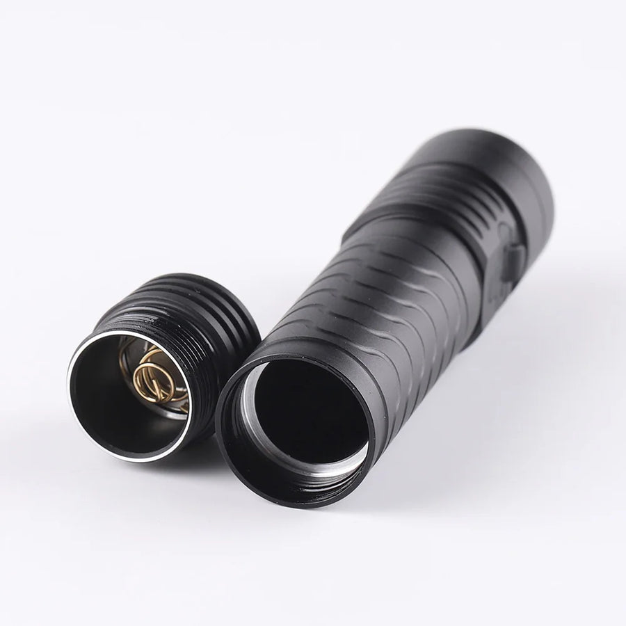 Black flashlight on a white background