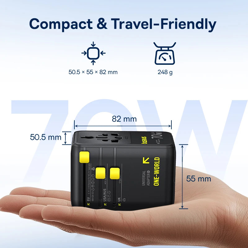 baseus travel adapter held in a hand
