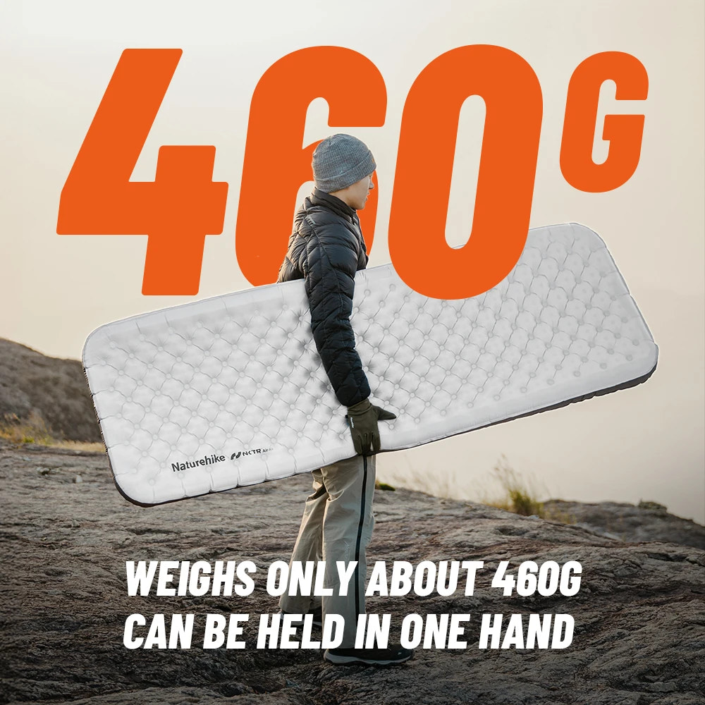 Person holding a lightweight mattress with text indicating weight and portability